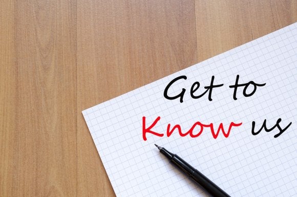 Get to Know Us Note with pen